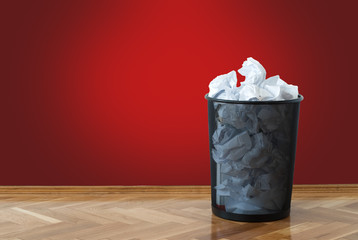 Full wastepaper basket