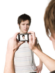 Taking a picture of his friend