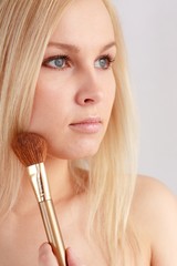 Fototapeta premium woman with make up brush