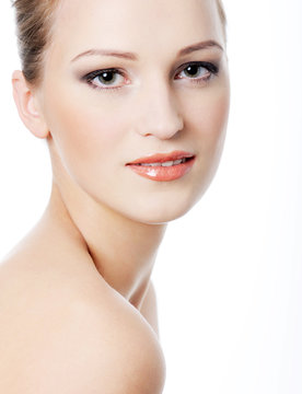 female face with healthy complexion