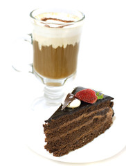 Chocolate cake with a cup of cappuccino