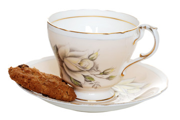 cookie with old tea cup and saucer
