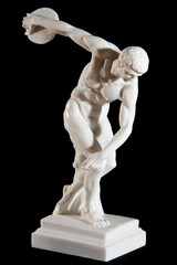 Classical white marble statue of naked discus thrower