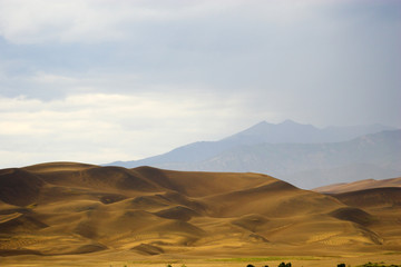 Thunderstorm over sand dunes
