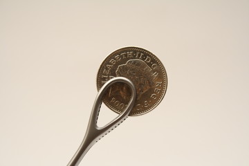 coin - surgical tweezers 1