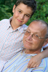 Portrait of grandfather and kid