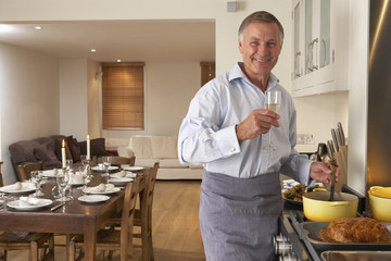 Man Preparing Food For A Dinner Party