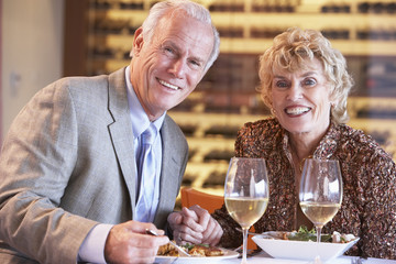 Senior Couple Having Dinner Together At A Restaurant