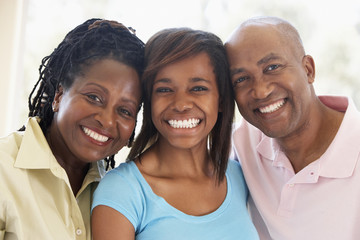Couple With Their Teenage Daughter