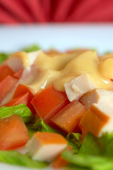 Plate with salad, tomato, cheese, balyk