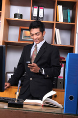 Fototapeta premium Young business executive in the office