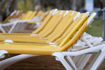 chaise longues on the beach