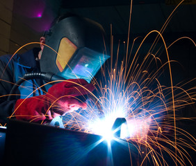 Welder with sparks