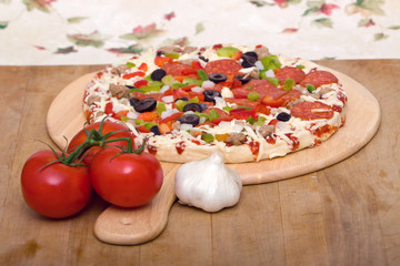 Fresh italian pizza and vegetables