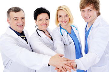 unity of four happy successful doctors