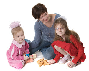 Naklejka premium mother plays with two daughters