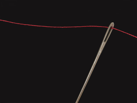 Needle on black background