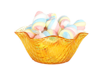 Multicolored marshmallows in the glass bowl