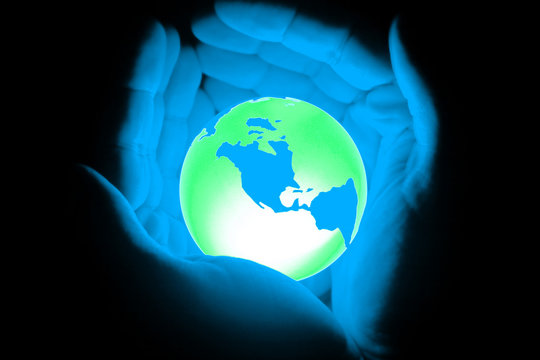 hand holding globe world