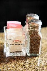 Salt pepper and sugar condiiments