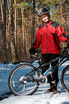 girl with bike in the spring forest