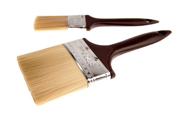 Two paintbrushes on white background