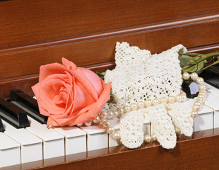 Roses on a piano