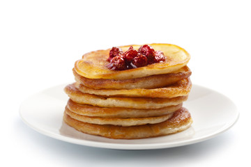 sweet pancakes with strawberry jam isolated