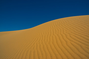 Sand dune against the sky.