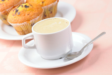 Cup of coffee and muffins