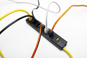 Power cords plug into a surge protector