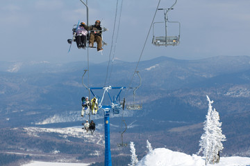 Skiers on a ski lift
