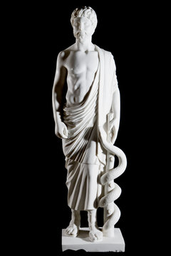 White marble classic statue of Asclepius isolated on black