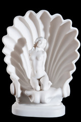 Classic white marble statuette of Aprodite isolated on black