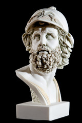Classical painted marble Zeus Bust isolated on black