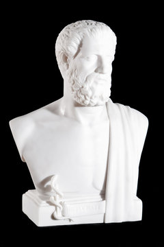 Classical white marble bust of Hippocrates isolated on black