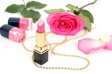 Obraz na płótnie Canvas Pink lipstick and flower