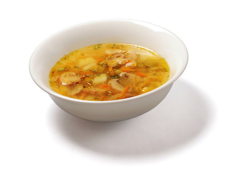 Soup with potatoes, mushrooms, carrot, dill and pepper