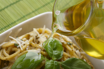 Italian pasta with pesto sause, parmesan and olive oil.