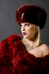 sexual girl in a red fur cap