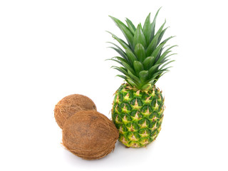 ripe pineapple and coconut on a white background