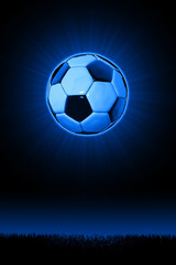 Fototapeta premium Soccerball with grass horizon line