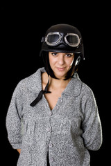 girl with US Army-style motorcycle helmet with goggles