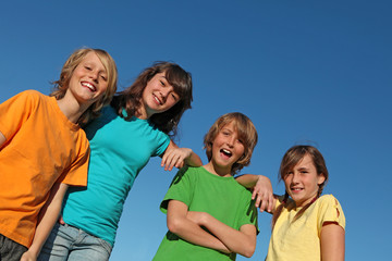 group of happy smiling kids hanging out