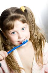 Girl with toothbrush