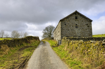 Fototapeta premium Stone barn in countryside