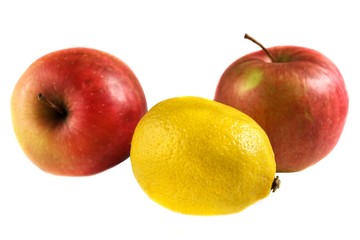 Lemon and apples isolated on white background