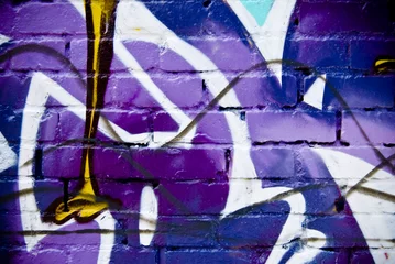 Photo sur Aluminium Graffiti Graffiti detail on a textured brick wall