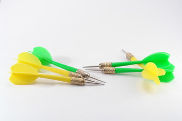 Multi-coloured darts on a white background