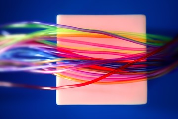 Glowing square with colorful wires such a wired communication
